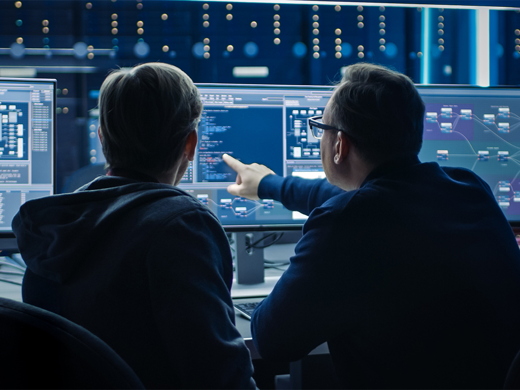 Cloud engineers at their desk